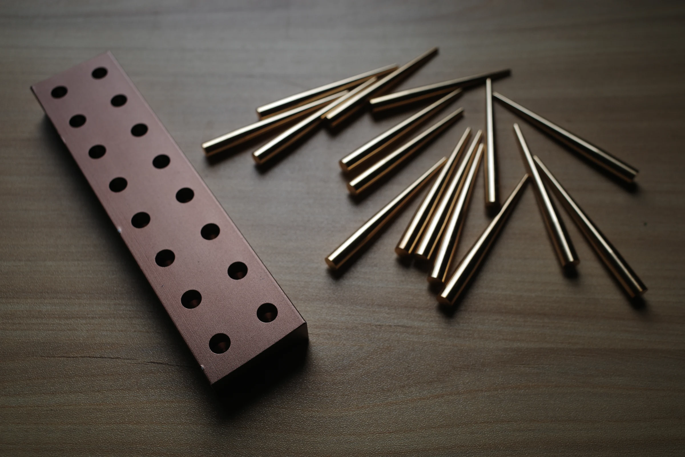 HY forming pins beside a drying rack. thumbnail